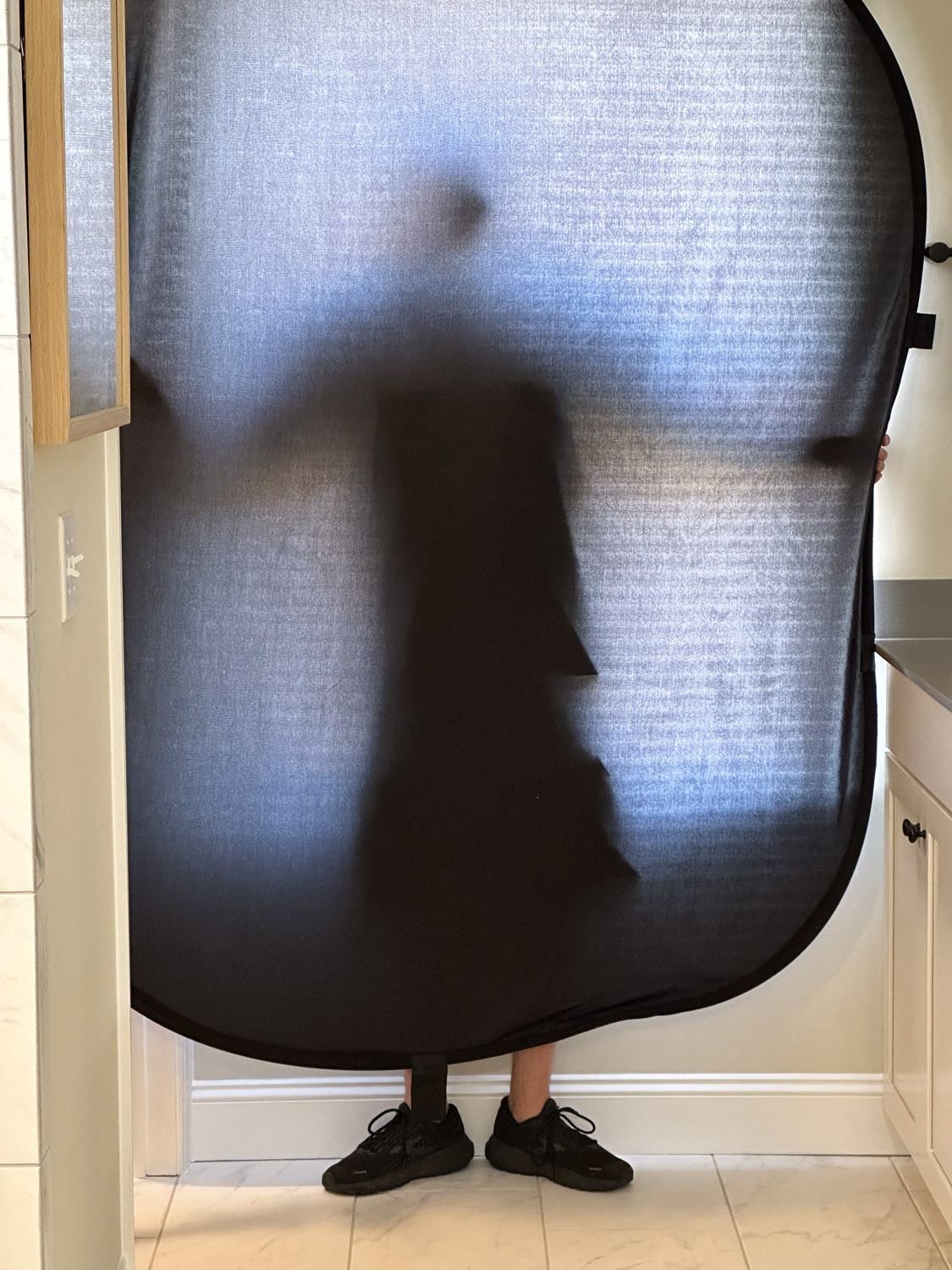 A reflector can also be used by a professional photographer to STOP or reduce light